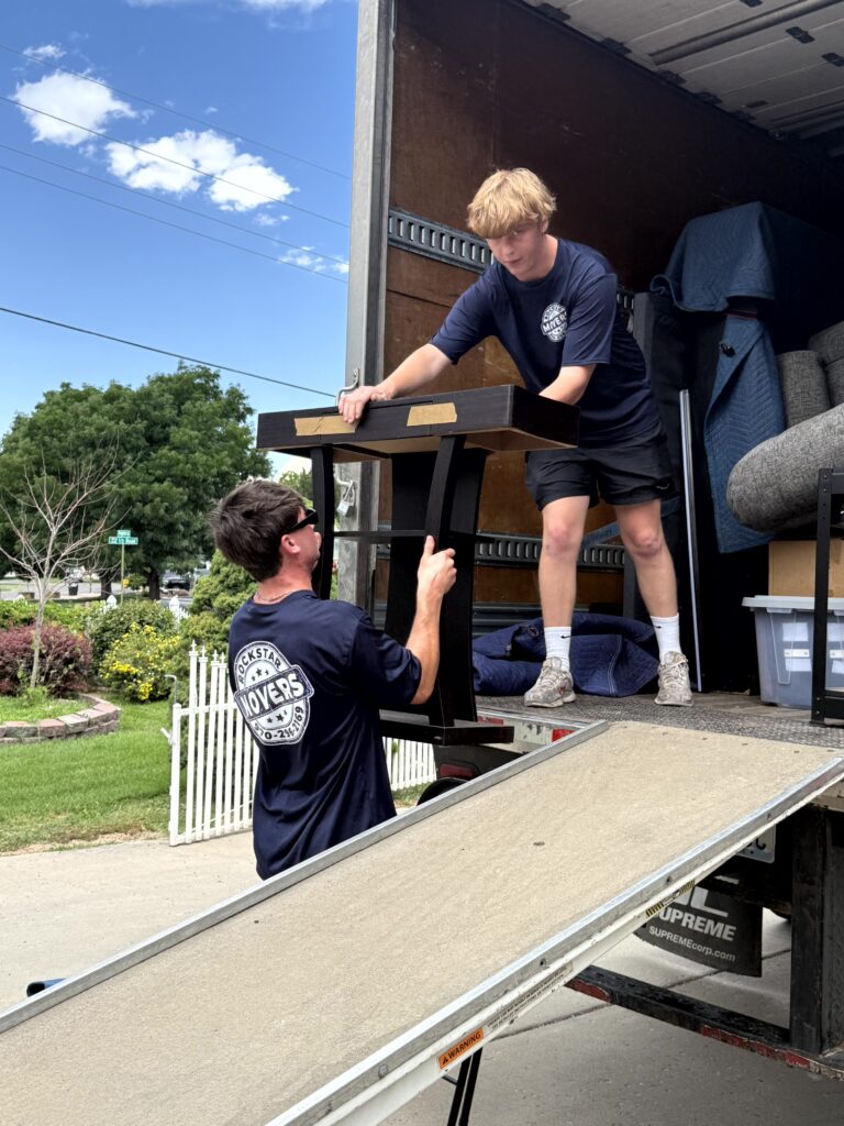 Photo of movers unloading a truck